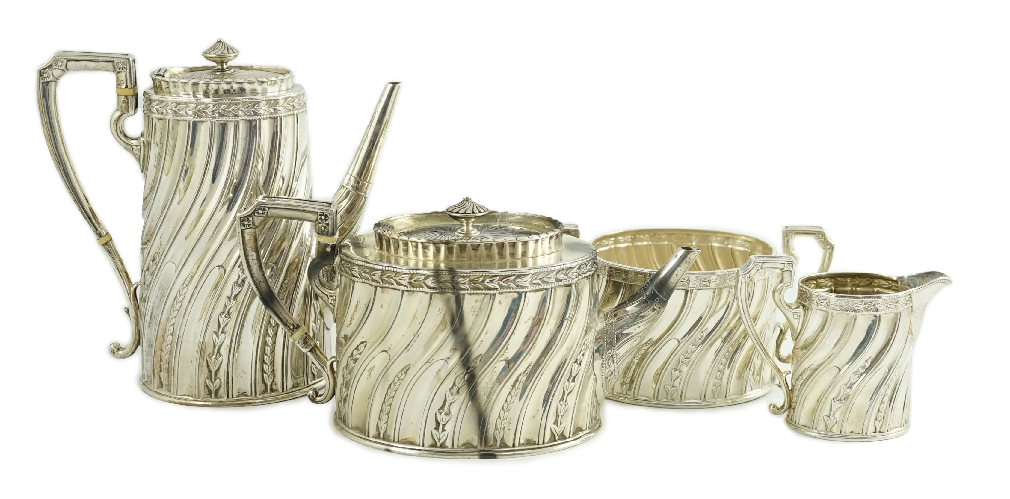 A late Victorian silver four tea and coffee service, by Walter & John Barnard